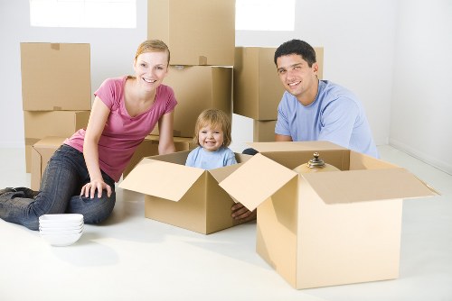 Office removals planning in Brent with moving boxes and workplace setup