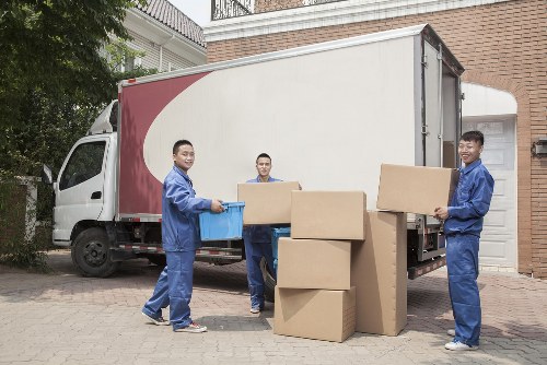 Removal team loading household belongings for a move