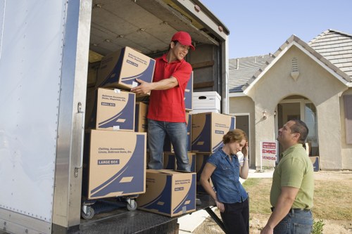 Local movers handling furniture during same day removals in Brent