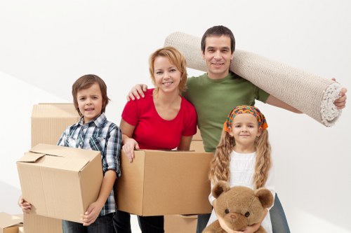 A moving team planning a Brent relocation in an apartment setting