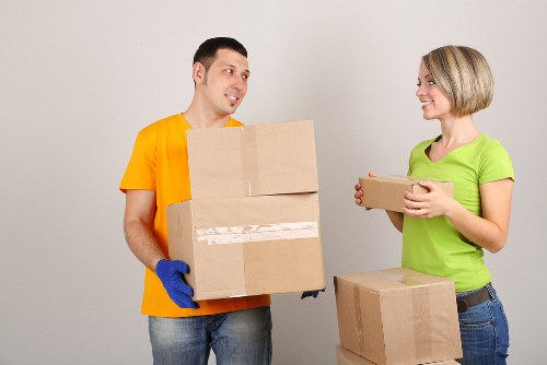 Home and business packing boxes arranged for a Brent moving day