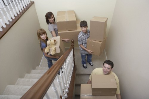 Packed office equipment ready for relocation services in Brent